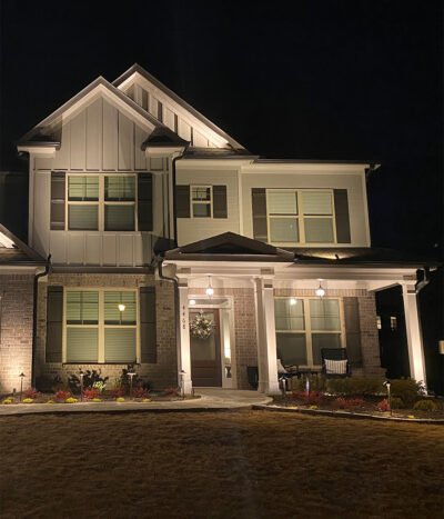 outdoor lighting 2 scaled Two story home at night with outdoor lighting fixtures by Southern Traditions Landscaping