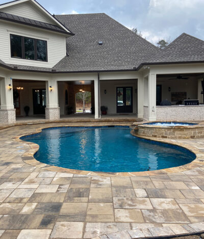 Outdoor pool on stone patio