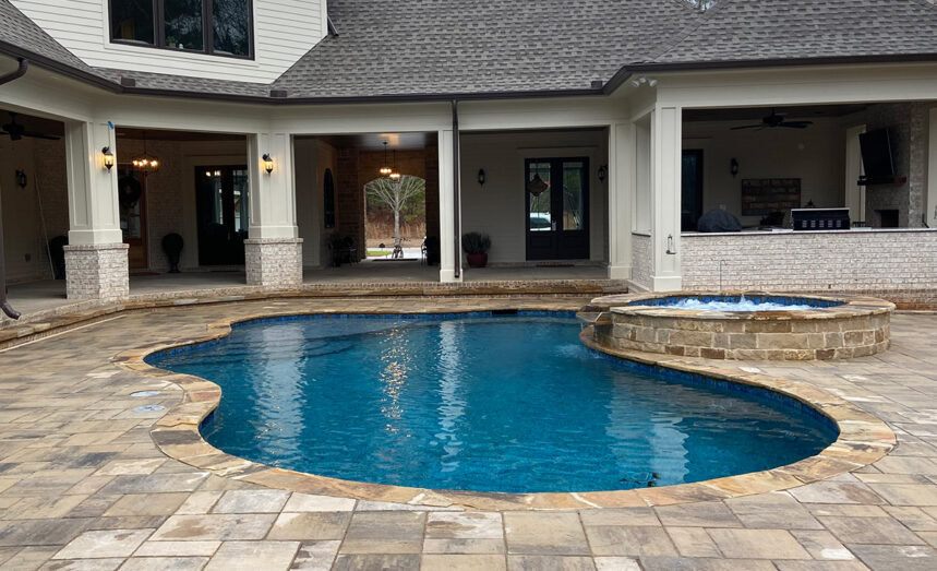Outdoor pool on stone patio